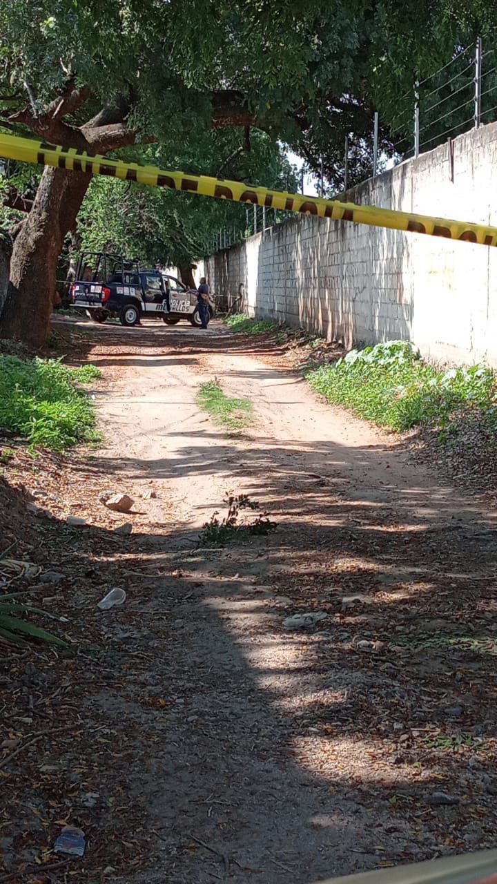 HALLAN CUERPO BALEADO EN YAUTEPEC